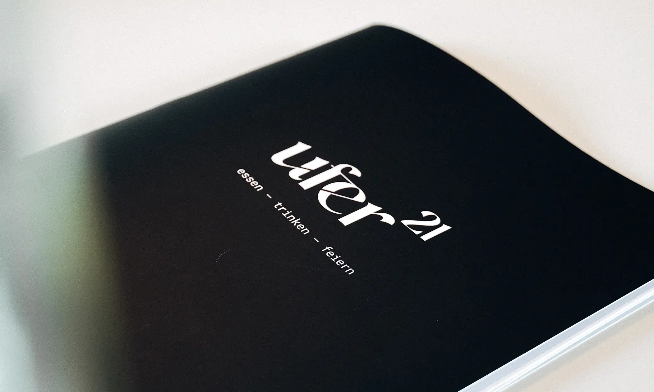 ufer21_speisekarte_cover_closeup_teamlemke_brandingagentur_aachen_2104x1264px